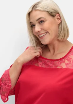 Tunika mit Spitze und Trompetenärmeln