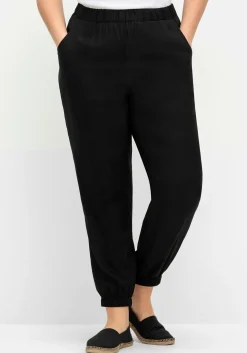 Weite, fließende Hose mit Bündchen am Saum