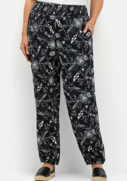 Weite Hose mit Blätterprint und breitem Smokbund