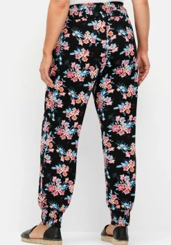 Weite Hose mit Blumendruck und Smok-Abschlüssen