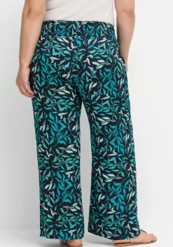 Weite Schlupfhose mit Smokbund und Blätterprint